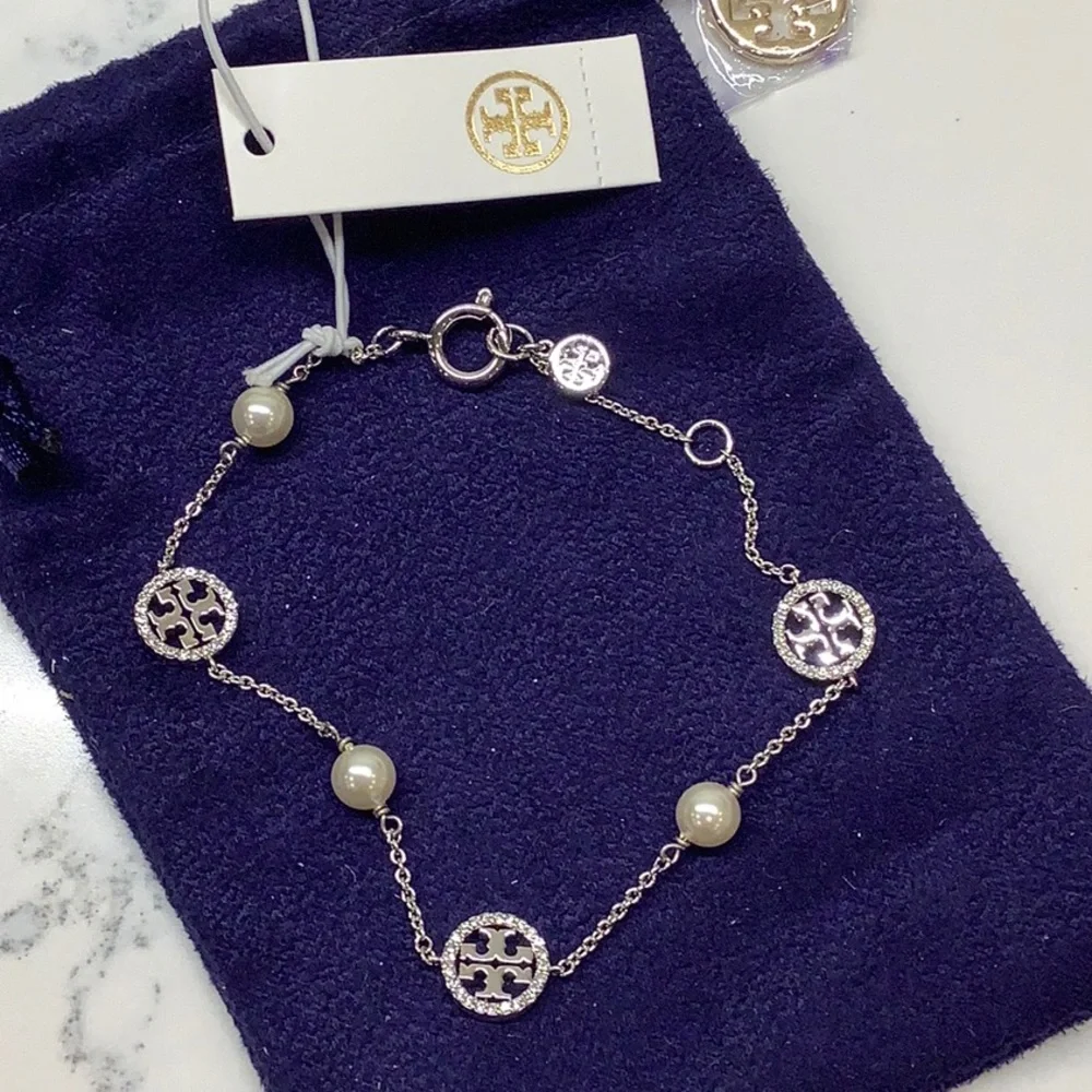 Tory Burch NWT Crystal-Pearl Silvertone Logo Delic $148 MSRP🔥